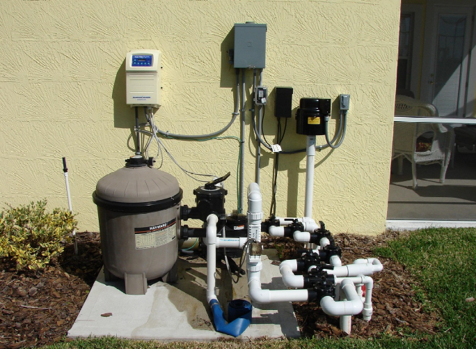 A sump pump placed in the corner of a home in Mount Prospect